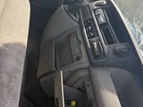 a picture of a car dashboard with a steering control