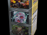 a box of pokemon trading cards on a black background