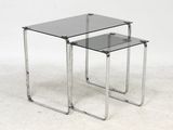 pair of chrome and glass nesting tables