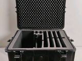 a black case with a camera inside of it on a white surface