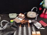 a black table with many items on it and a stuffed animal