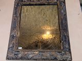 a picture of a reflection of a light in a mirror