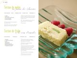 a piece of cake on a plate with raspberries on it