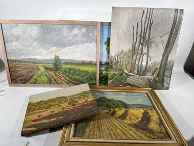 three paintings of a landscape are displayed on a white table