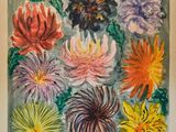 une image représentant un tableau de fleurs colorées sur fond vert