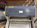 an image of a machine that is sitting on a pallet