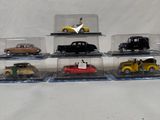 a lot of different model cars in a display case