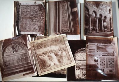 a lot of old photos that are on the table