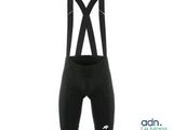 a close up of a bib shorts with suspends and a bib