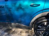 a blue car that has been painted with blue paint