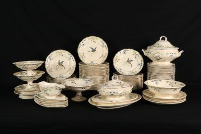 a lot of plates and bowls on a black background