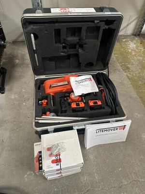 a tool kit in a case sitting on the floor