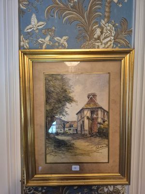 une photo d'un tableau accroché au mur