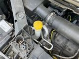 a car engine with a yellow cap on top of it