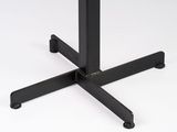 a close up of a table with a black base and a white background