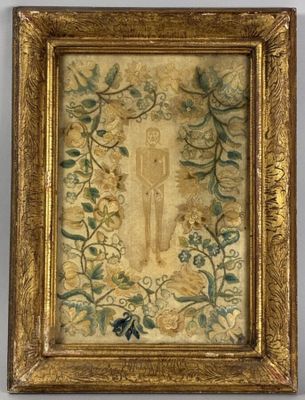 an old picture of a painting of a woman in a floral frame