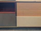 a wooden cabinet with two drawers and a shelf