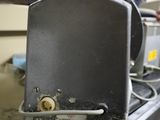 a toaster sitting on top of a counter in a kitchen
