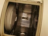 an overhead view of a washer and dryer in a bathroom