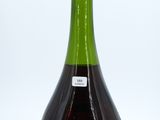 a bottle of wine that is sitting on a table