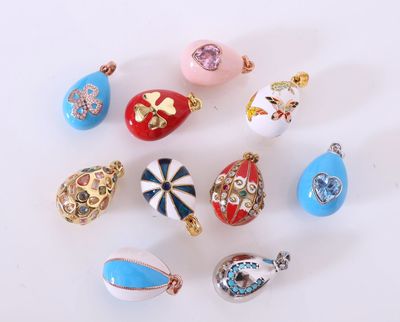 a lot of different colored glass beads on a white surface