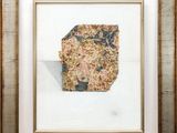 an image of a picture of a rock in a frame