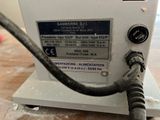 a close up of a machine with wires attached to it
