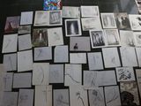 a lot of drawings on the floor of this room