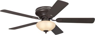 a close up of a ceiling fan with a light on it