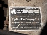a metal plaque on the side of a vehicle