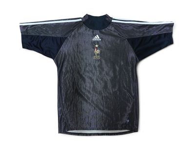 the shirt is black and white with a picture of a man riding a horse