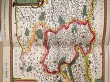 an old map of the country of england in a book