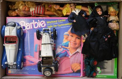 a cardboard box with a bunch of toys in it