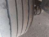 a close up view of a tire on a truck
