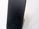 a close up of a cell phone on a stand