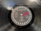 the record is on the table with the name of the band