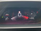 an image of a car dashboard showing the speed limit
