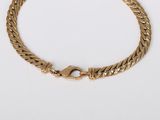 a gold chain bracelet with a clasp on a white background