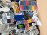 a box full of assorted electrical tools and wires