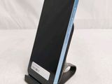 a cell phone that is sitting on a stand