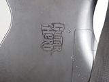 a guitar case that has a guitar strap on it