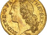 une pièce d'or représentant la tête d'une femme aux cheveux longs