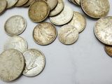 a lot of coins that are on a table