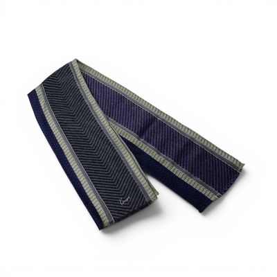 navy blue and grey striped neck tie on a white background