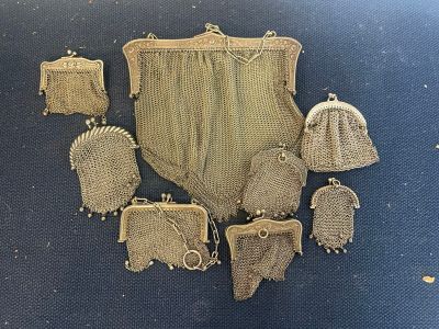 an image of a group of purses that are sitting on a table