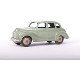 a toy car that is sitting on a white surface