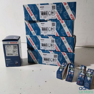 several boxes of toothpaste sitting on top of each other on a table