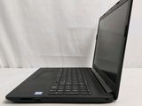 the laptop is sitting on a white surface with a white background