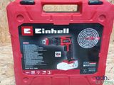 a red tool box with a red cordless drill in it