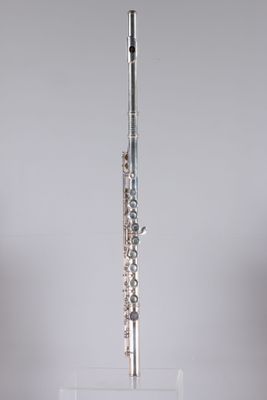 a flute that is sitting on top of a stand